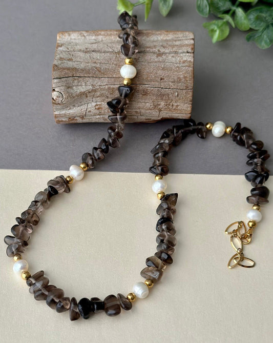 Crafted with carefully hand selected smoky quartz chips, high quality freshwater pearls, and 18k gold electroplated stainless steel components. 