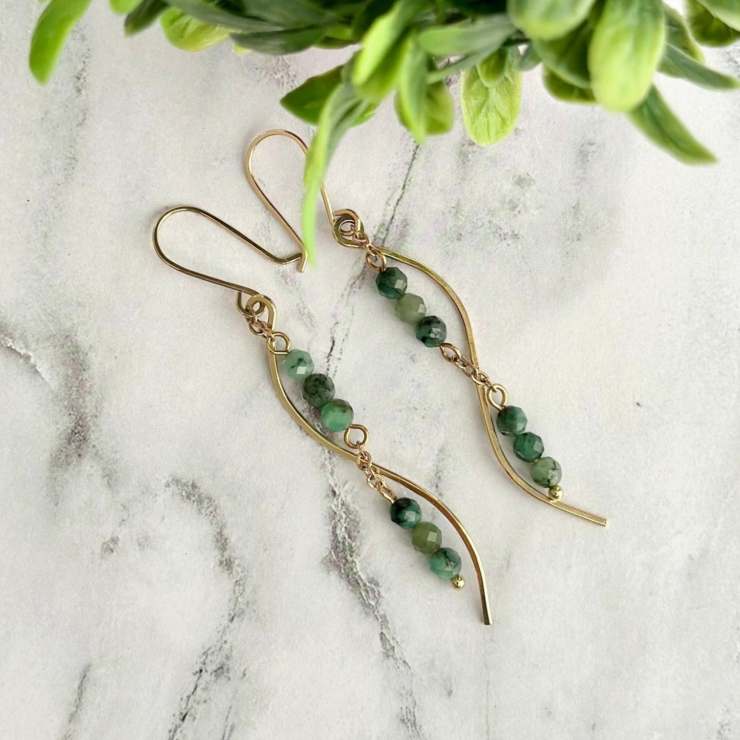 Delicate Earrings made with African Emerald faceted  14K gold filled ear hook  14k gold filled chain & hammered wire  2 3/4 inches length