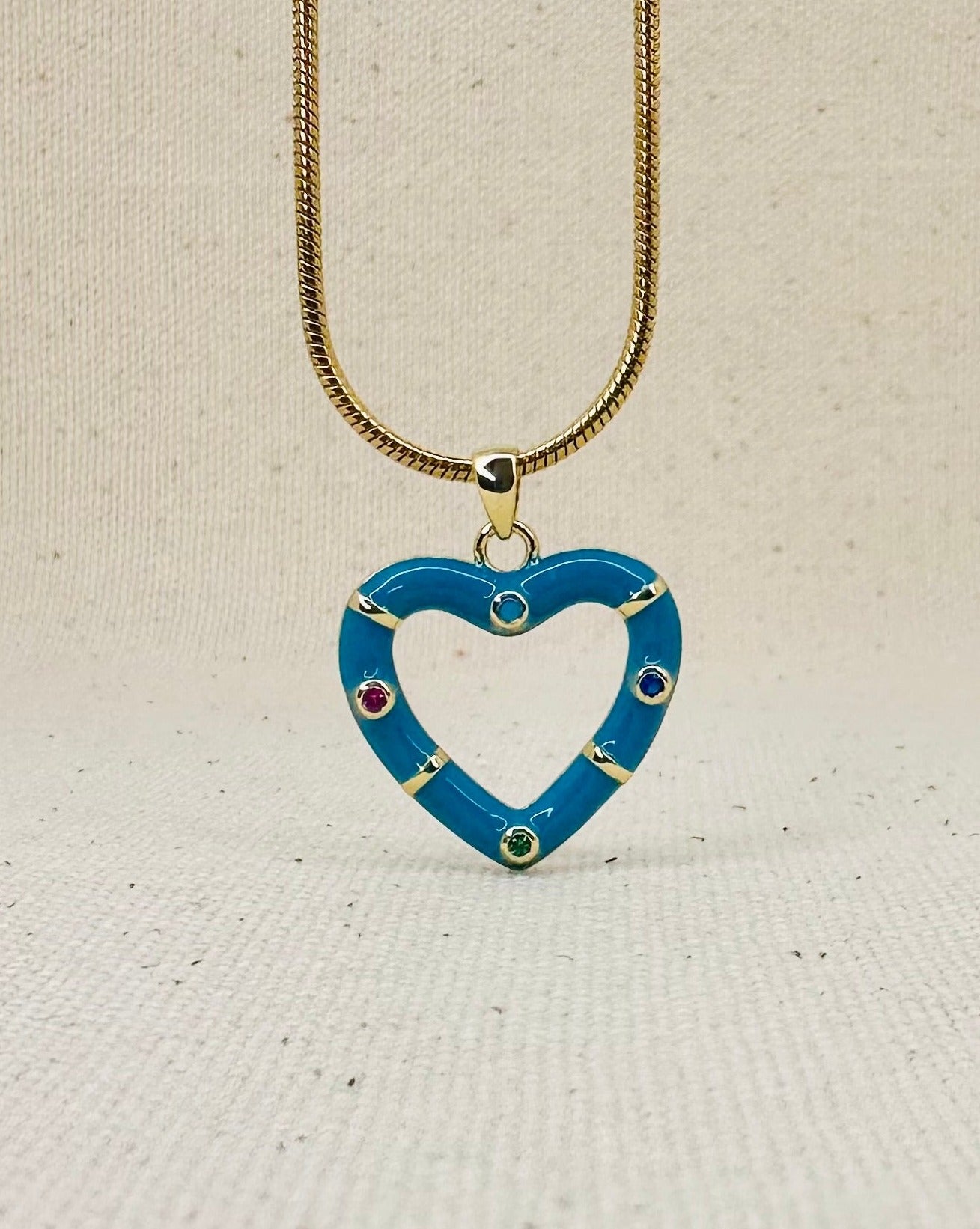 Heart necklace  with gold and blue  heart charm. 18 inches gold filled length rat tail chain.