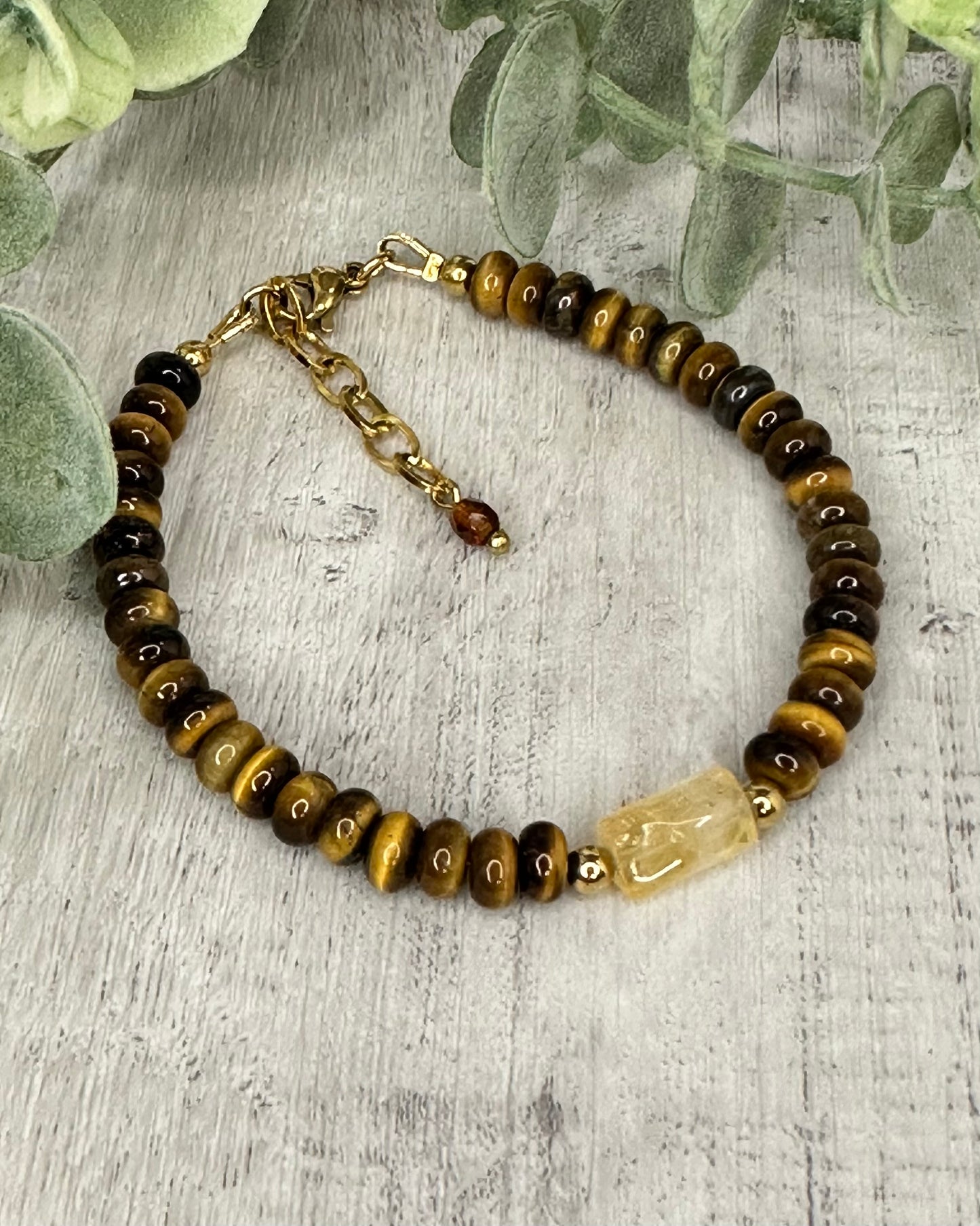 Beautiful tiger eye rondelle bracelet enhanced with a citrine tube gemstone and gold-filled accessories.