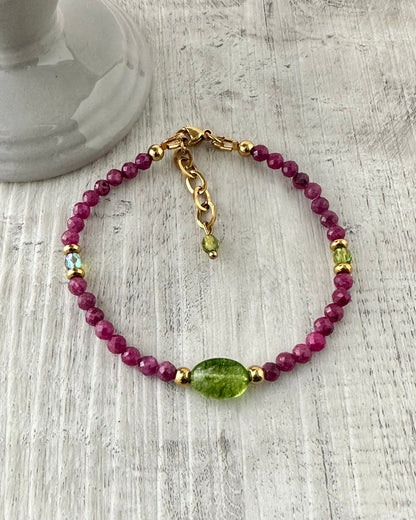 Stunning Ruby bracelet enhanced with a nugget green quartz and Czach crystal beads.