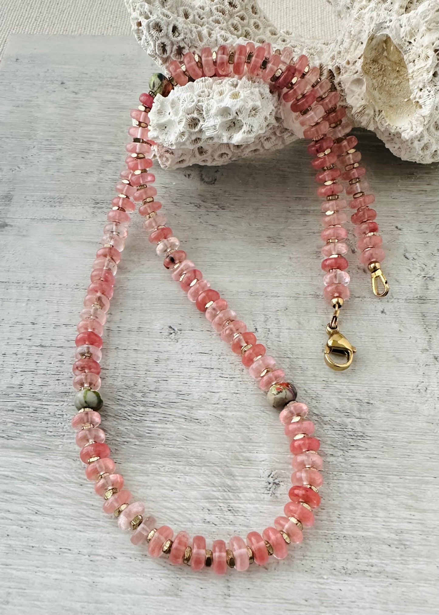 Beautiful necklace crafted with AAA strawberry quartz, Impression jasper accents and gold-filled components. Experience the beauty and benefits of natural gemstones.