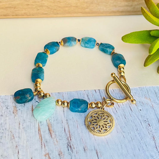 Dazzle your wrists with this beautiful bracelet designed with blue apatite and stainless steel components.