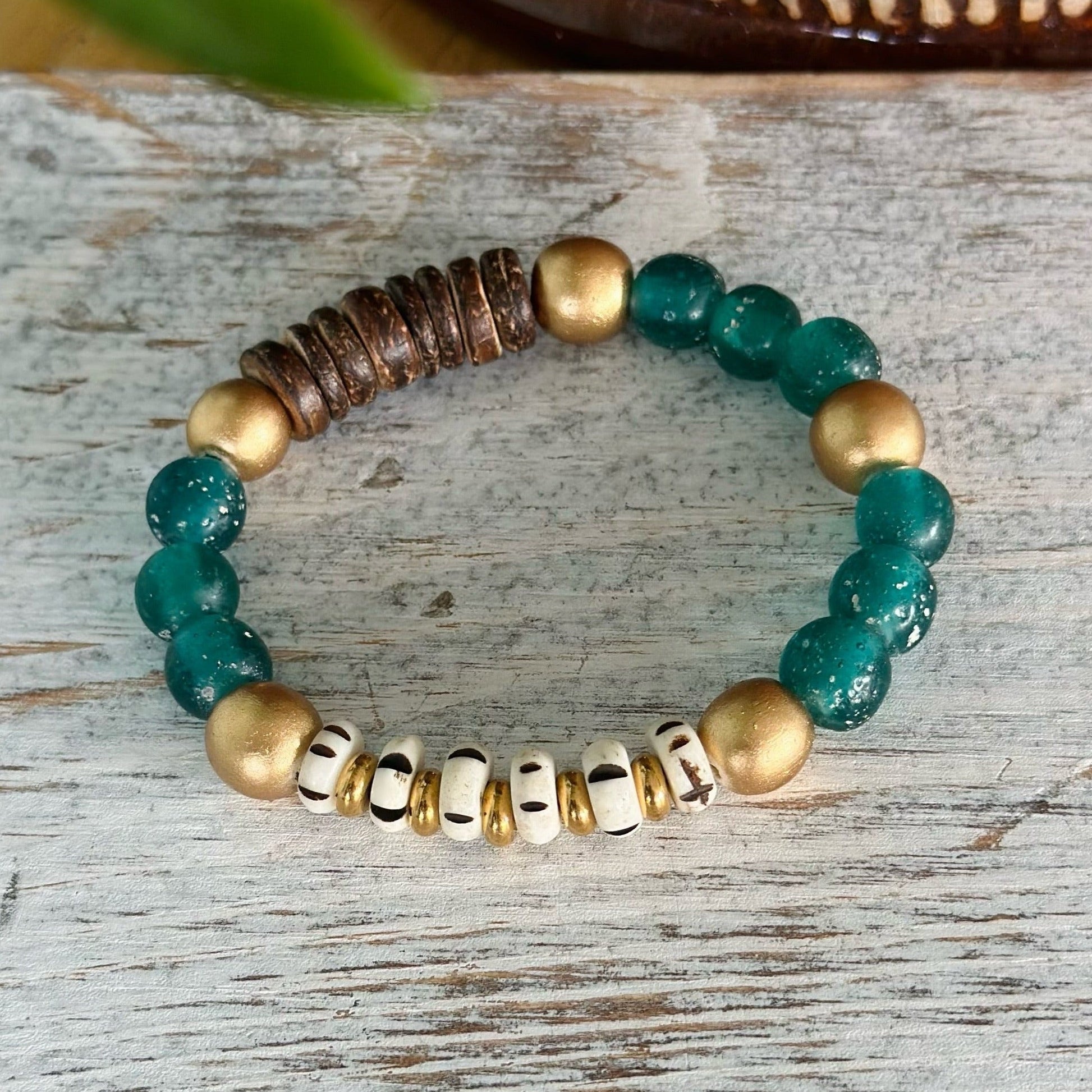 Cobalt Green Bracelet is handmade and eco-friendly. Crafted from recycled "Sea Glass" beads, natural carved beads, and gold wood beads