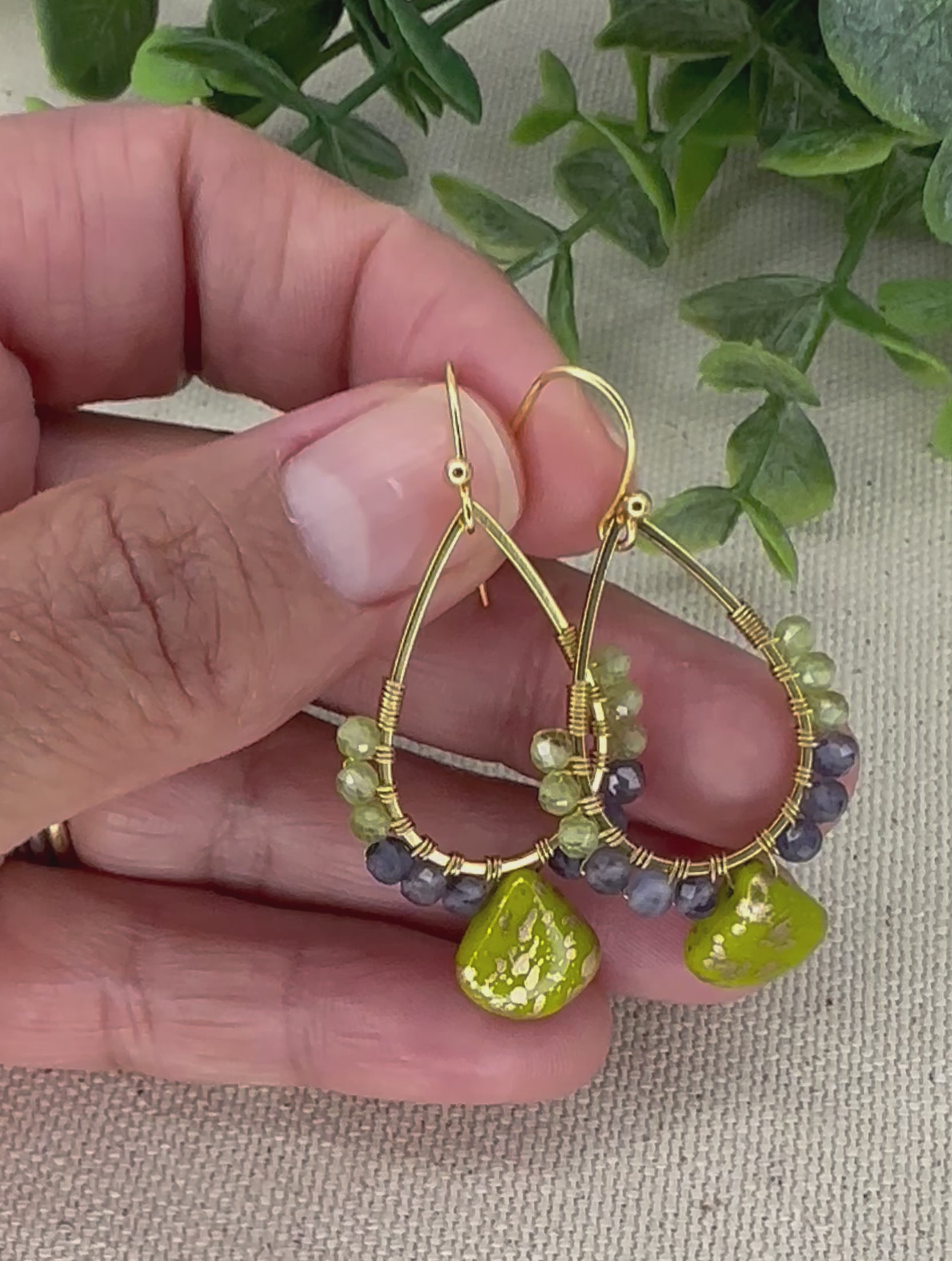 Stunning dangle earrings, made with stainless steel components and Peridot and Iolite gemstones beads.