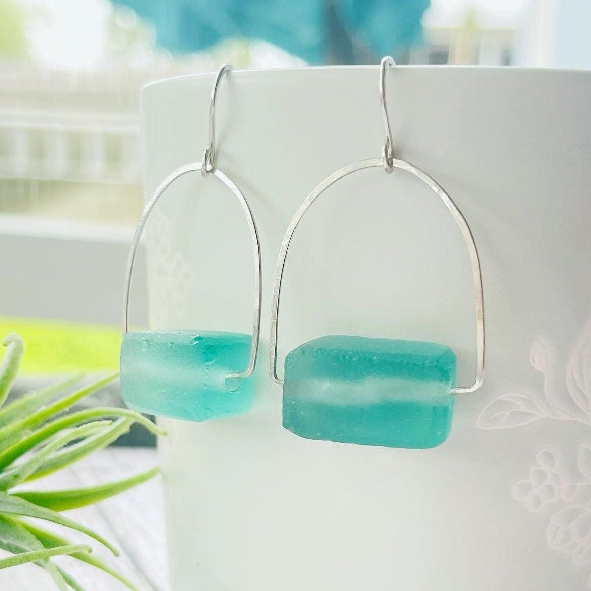 These Magic Green Earrings are made from  925 sterling silver, and a chunky bead Java recycled glass green aqua color, making them earth-friendly and delightfully eye-catching. Gift for women, earrings for the beach, every day earrings.